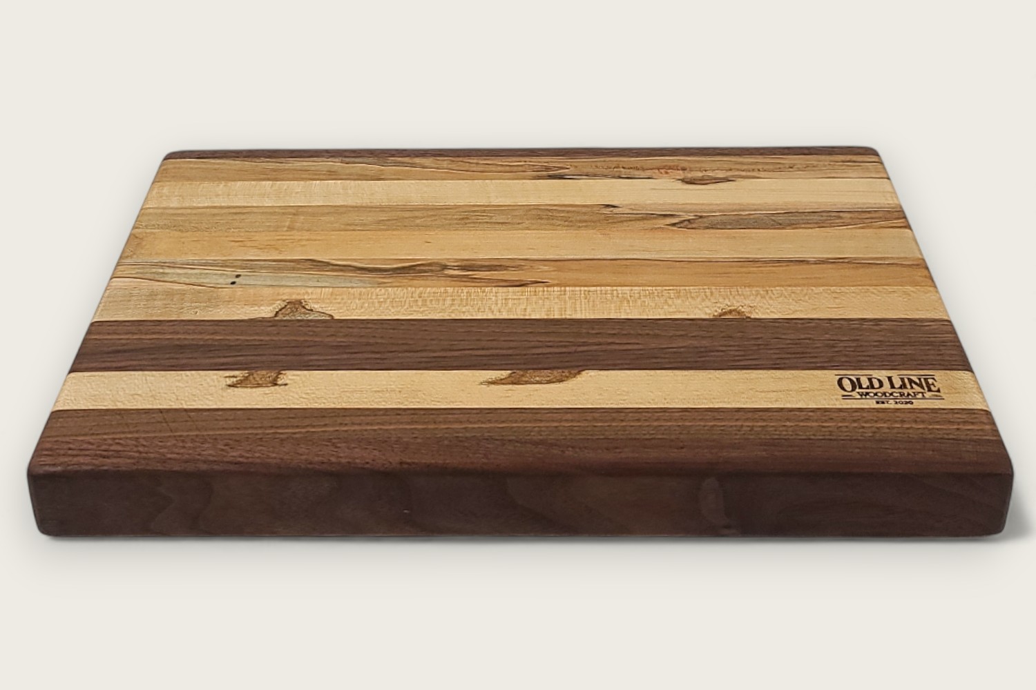 Spaulted Maple & Walnut Butcher Block Board with edge-grain horizontal pattern, light and dark wood tones.